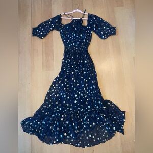 Blue dress with gold stars from Calypso